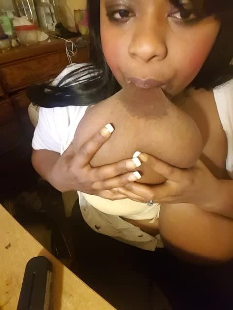 Sexy Rene Love sucking her own glorious boobs