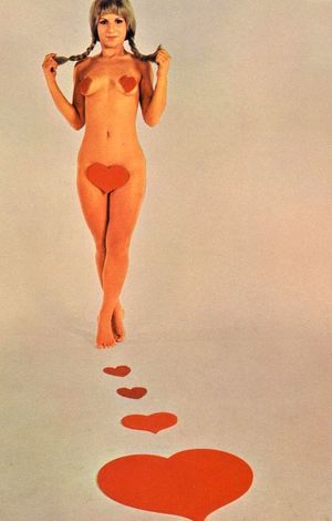 Vintage Blonde Teen in Valentine's Day Pin-up with heart-shaped pasties and pigtails