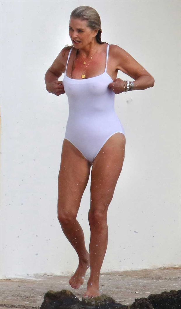 Christie Brinkley Nipples in Wet White Bathing Suit