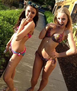 Two honeys being shy in front of the camera