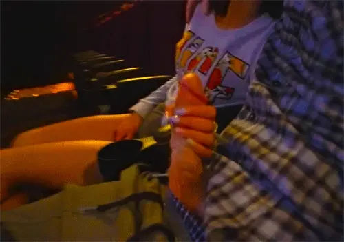 Hot handjob at the movies