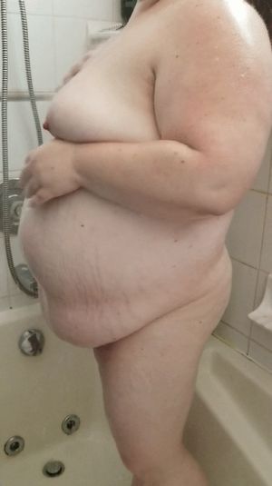 BBW washing her belly in the shower