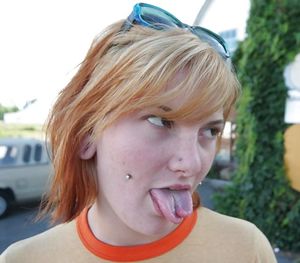 Pierced Teen with split Tongue