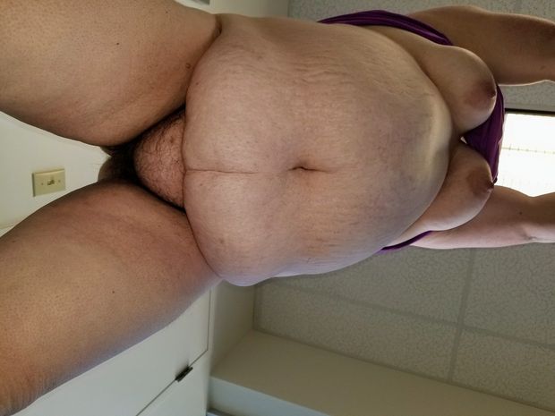 BBW bent over desk showing off hanging belly and tits