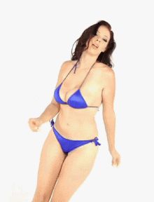 Gianna Michaels shaking in Blue Bikini