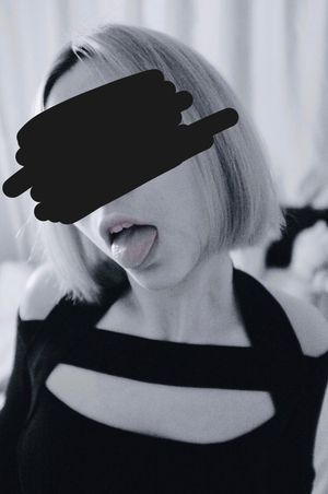 sexy japanese in dark dress tounge out