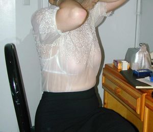 Dressing for an evening event. She will (temporarily) have a shawl