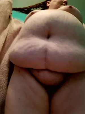BBW nude fresh from a shower drying her hair