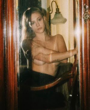 Lili Reinhart topless hand bra