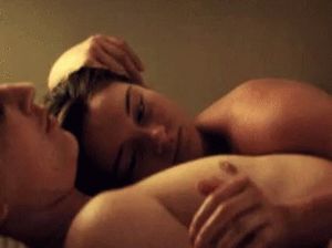 Gentle cuddle with hair stroking and hand holding