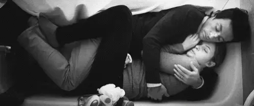 Cuddling in the bath, with our clothes on
