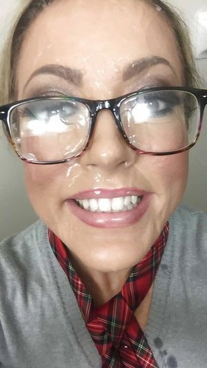 she cleans her glasses with cum