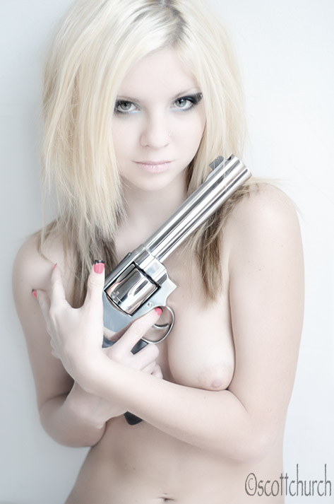 hot blonde with gun