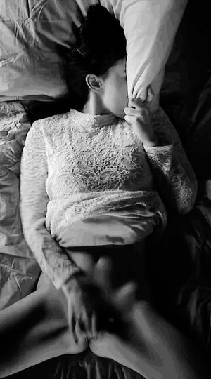 stifling her screams