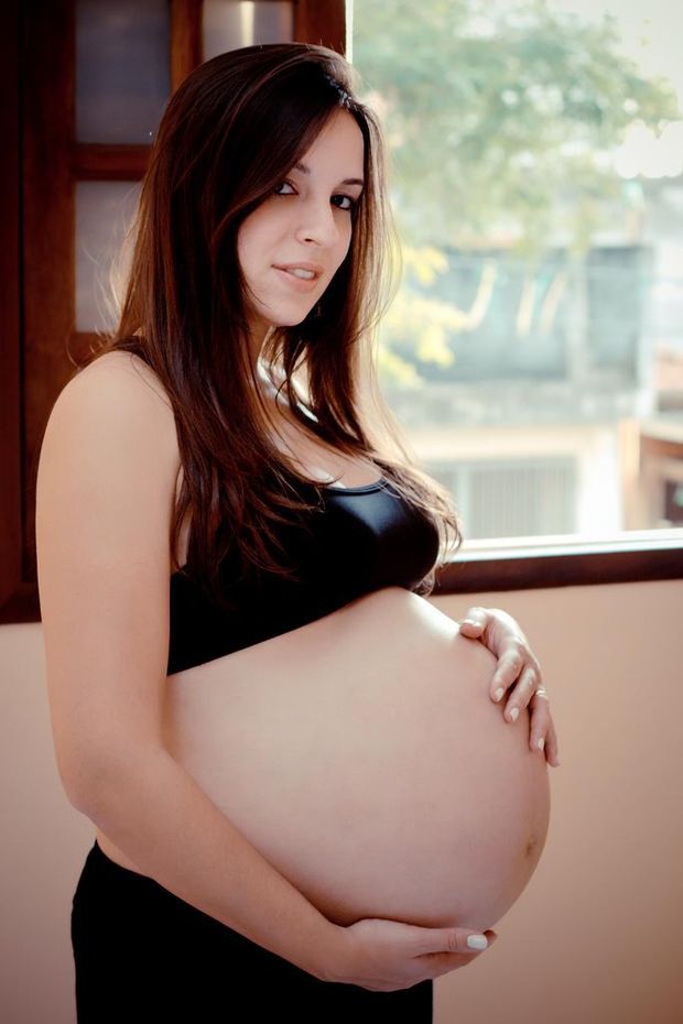 Stunning pregnant babe