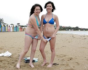 Naughty woman on the beach