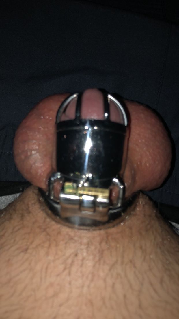 My cock squeezed into my smallest cage.