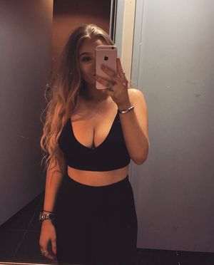 Blonde with massive tits in sports bra