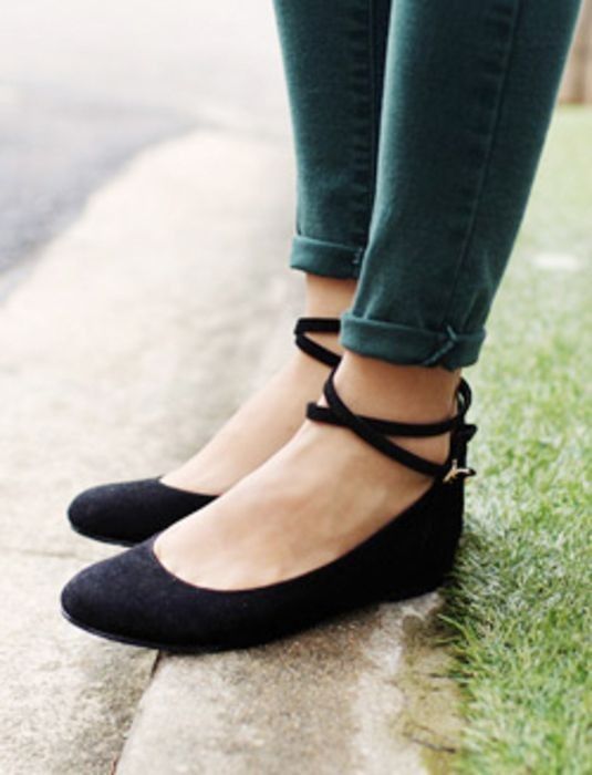 Nice feet in black strap flats