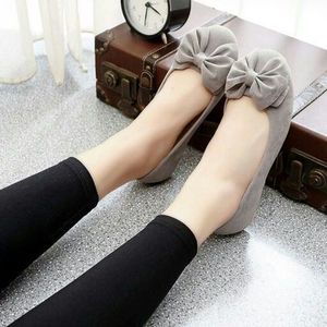 Amazing feet in ribbon flats and leggings