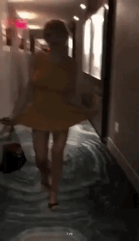You Never Know What You Might See In A Hotel Corridor