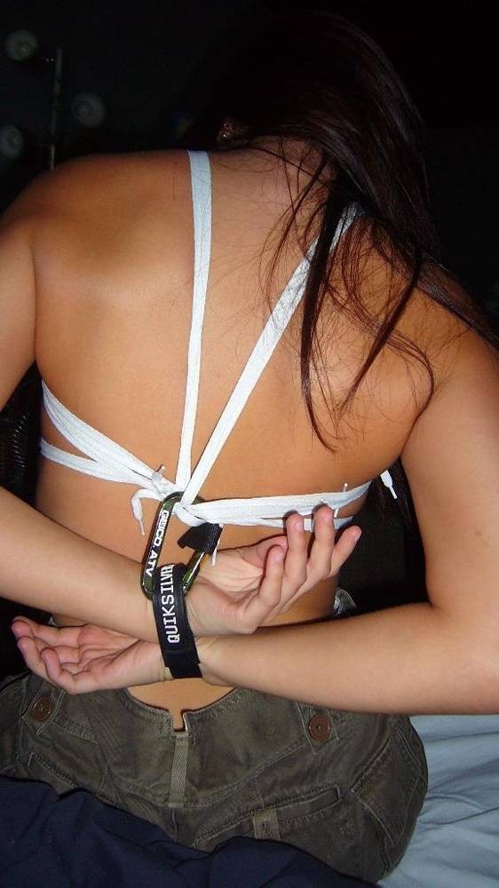 Such an easy way to restrain them... either she keeps her arms back there... or She walks around topless!