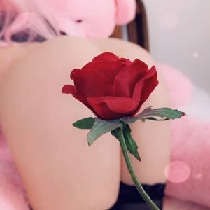 Belle Delphine ass covered with a rose
