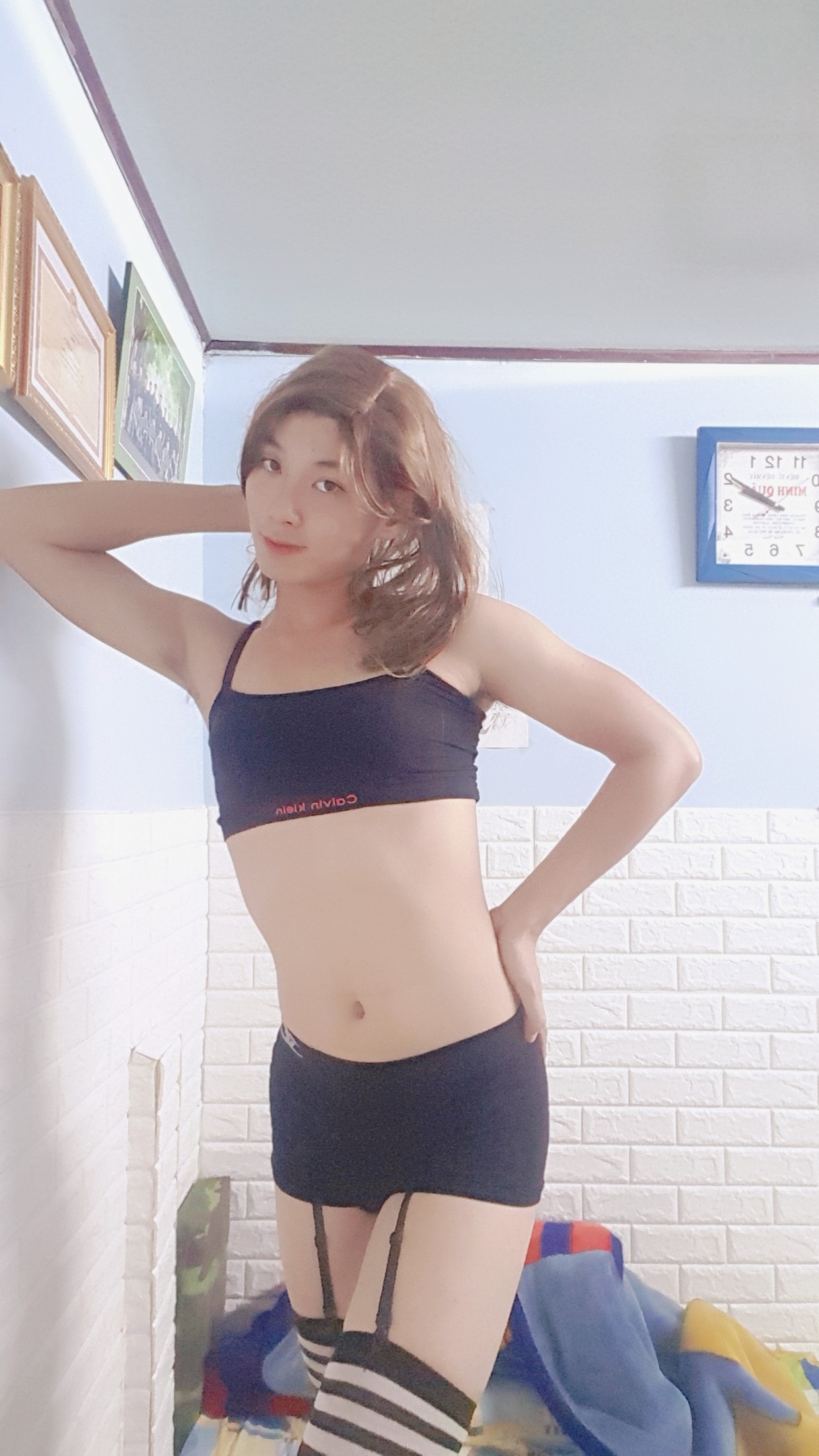 Cute Asian posing for attention