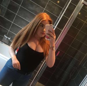 Busty redhead teen