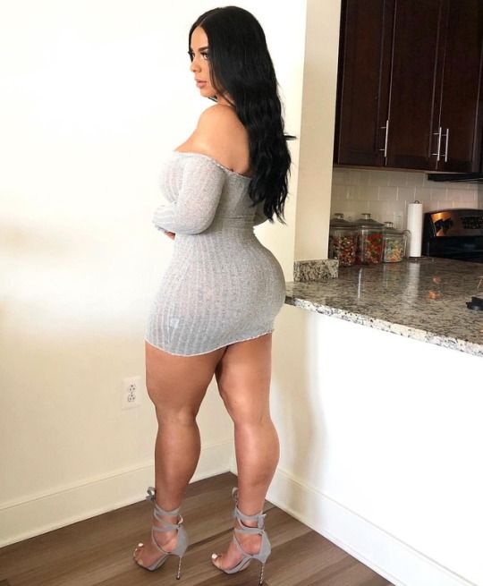 Thick chick in a see through dress back