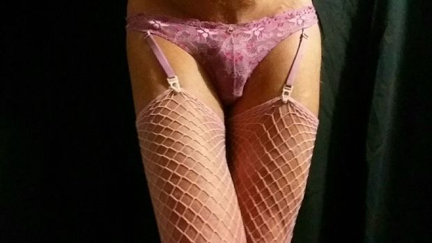 My sexy pink suspender thong with industrial net stockings
