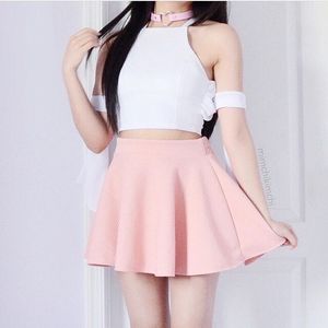 White body, pink skirt and pink choker