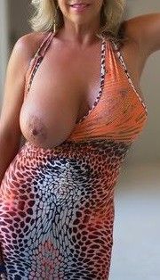 Actual real pic of mom. I love playing with her gigantic tits.