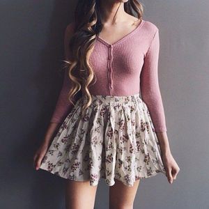 Pink jacket and drawn skirt