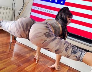 Yaela Heart Does yoga in sheer camo leggings