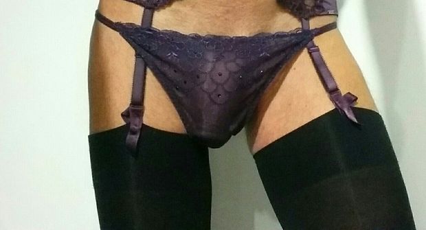 My purple suspenders and thong with black stockings