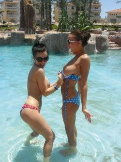 Outdoor pool, bikini babes flashing tits
