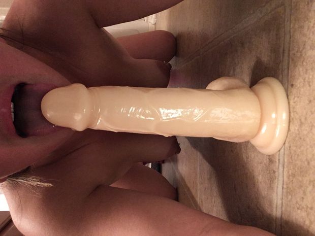 Slut wife teasing dildo topless