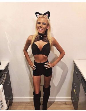 Hot blonde teen dressed up is a sexy pussycat