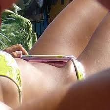 A trimmed pussy under a bikini bridge