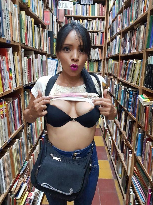 Sexy Mexican babe in library
