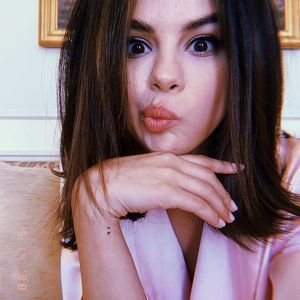 Selena Gomez goofy kiss