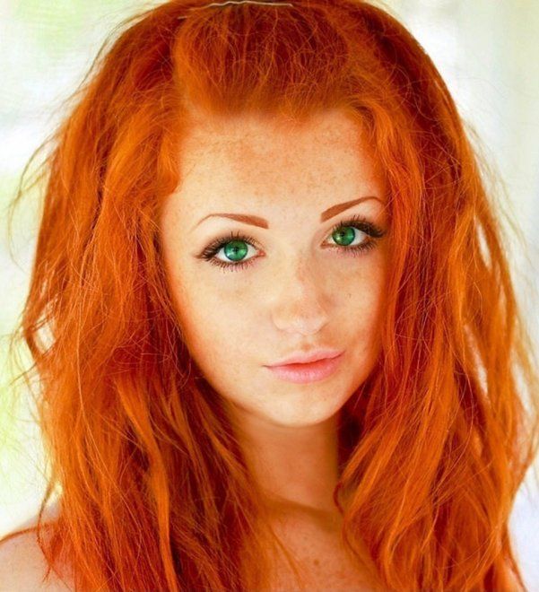 Redhead with Brilliant Green Eyes