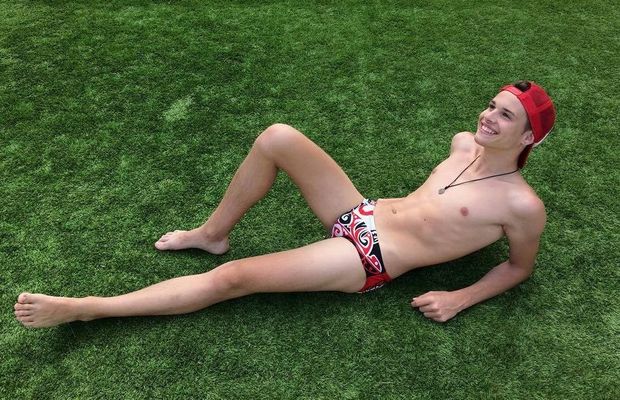 Topless cute gay in panties