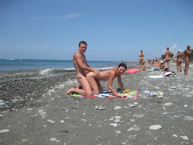 This Nudist swinger couple are having sex on the nudist beach