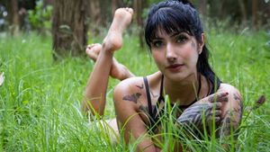 Sexy tattooed brunette