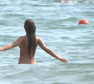 teen enjoying life being nude at beach