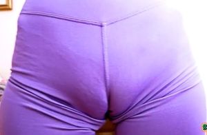 Kasumi in purple yoga pants