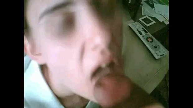 She licks her boyfriend's dick during a blowjob