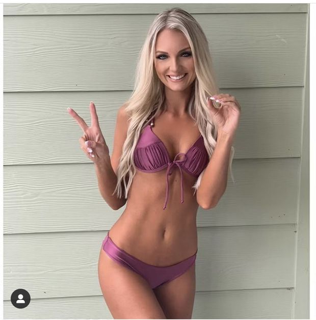 Lindsay Lynch is looking sexy as hell in purple bikini with big boobs and cleavage